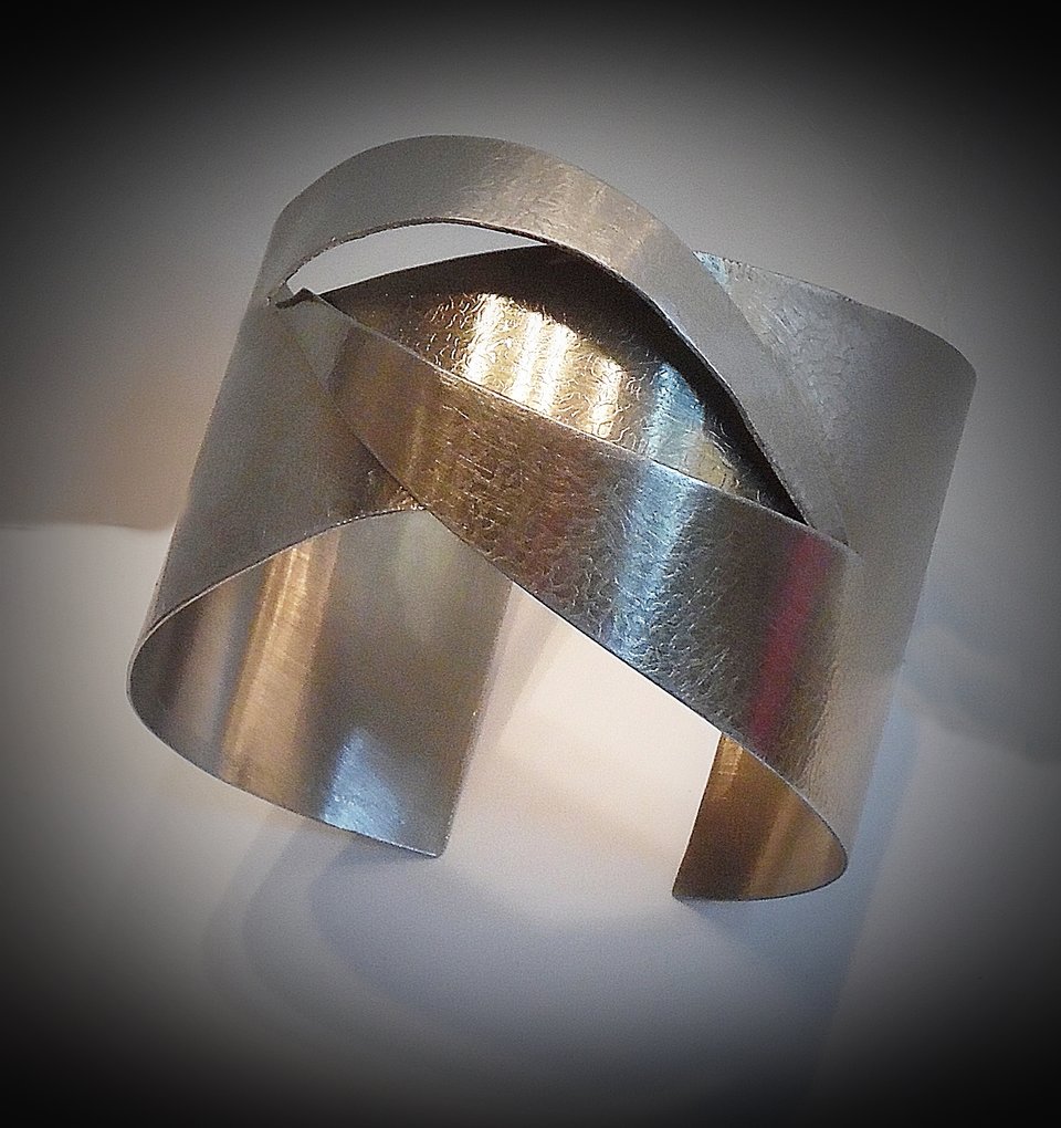Embossed stainless steel cuff